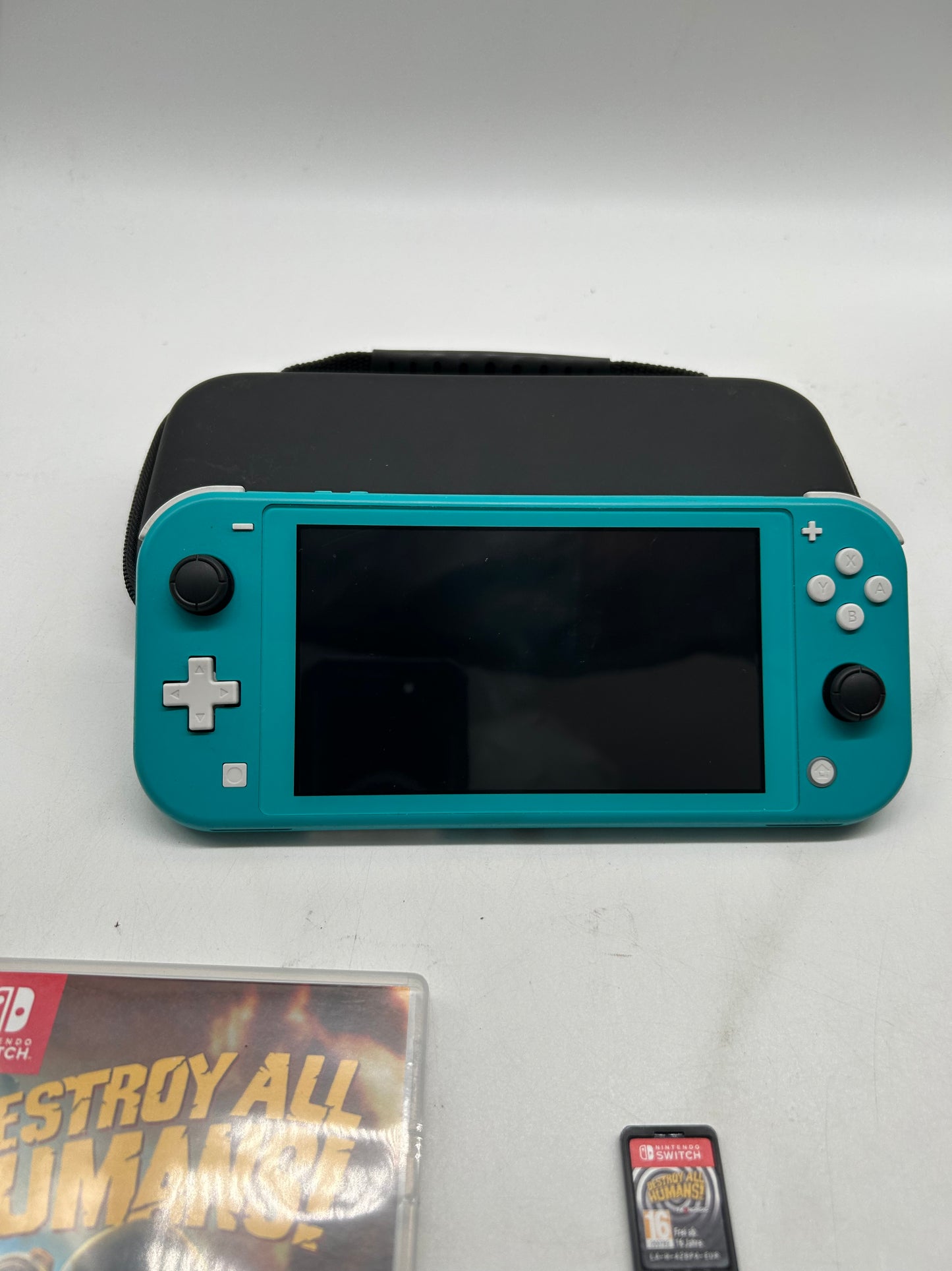 Nintendo Switch Lite Türkis mit Spiel und Tasche