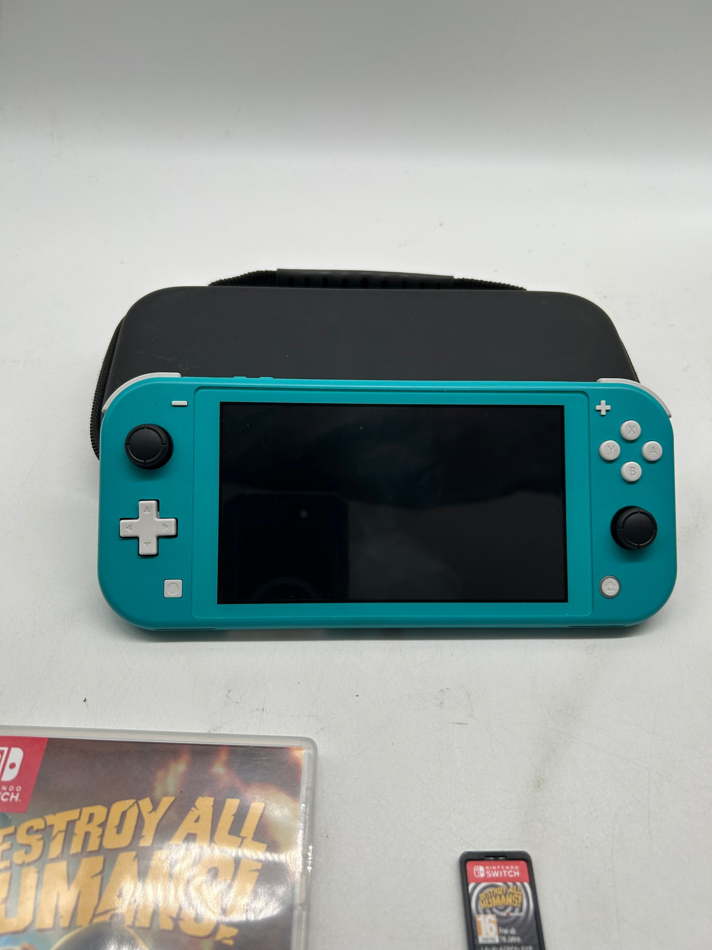 Nintendo Switch Lite Türkis mit Spiel und Tasche