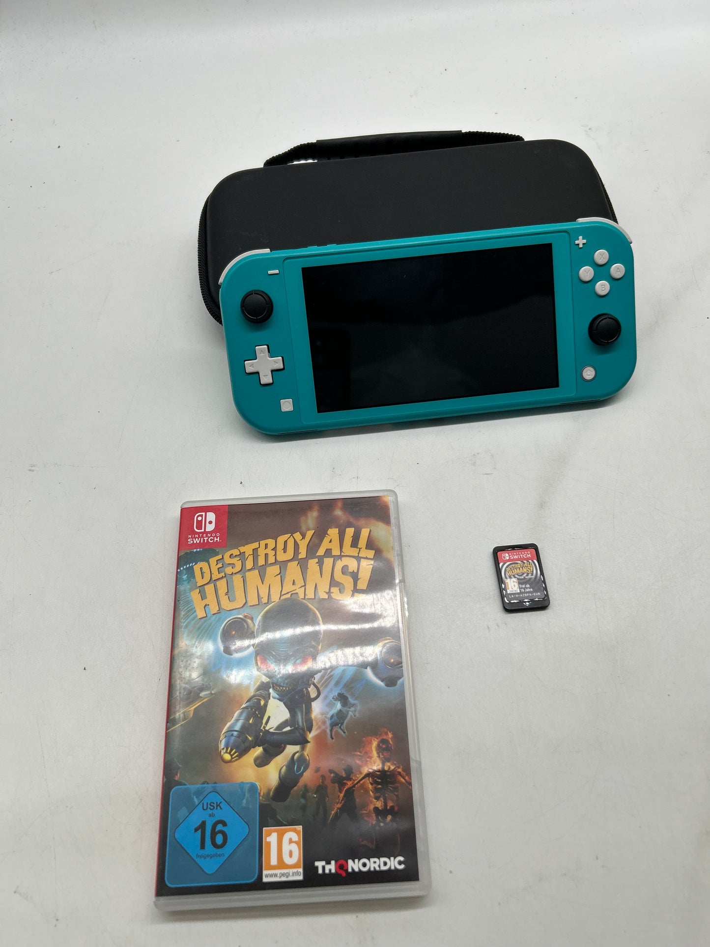 Nintendo Switch Lite Türkis mit Spiel und Tasche