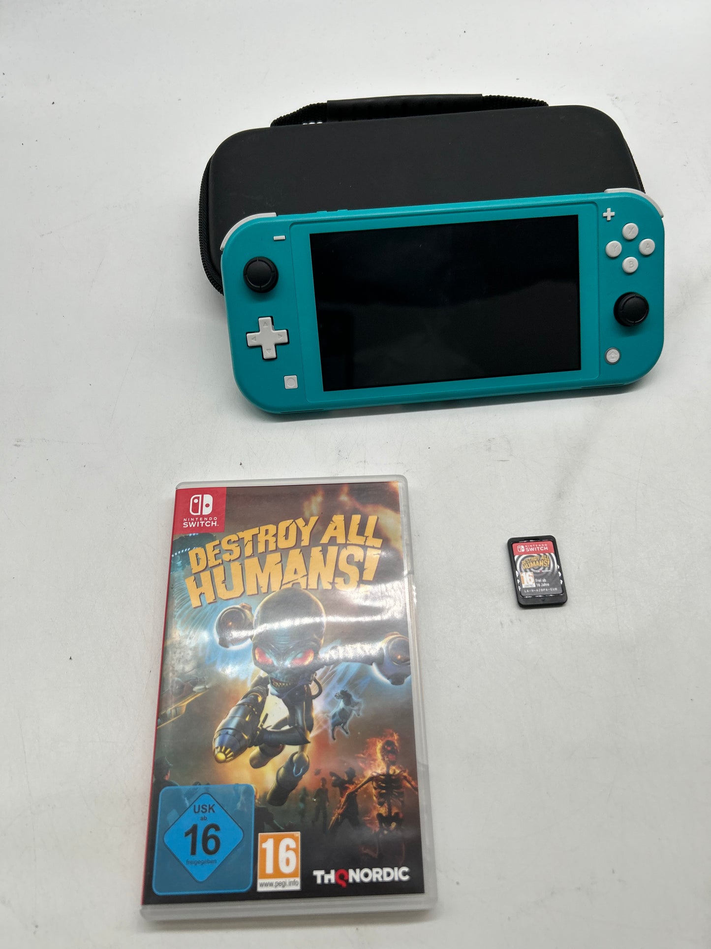 Nintendo Switch Lite Türkis mit Spiel und Tasche