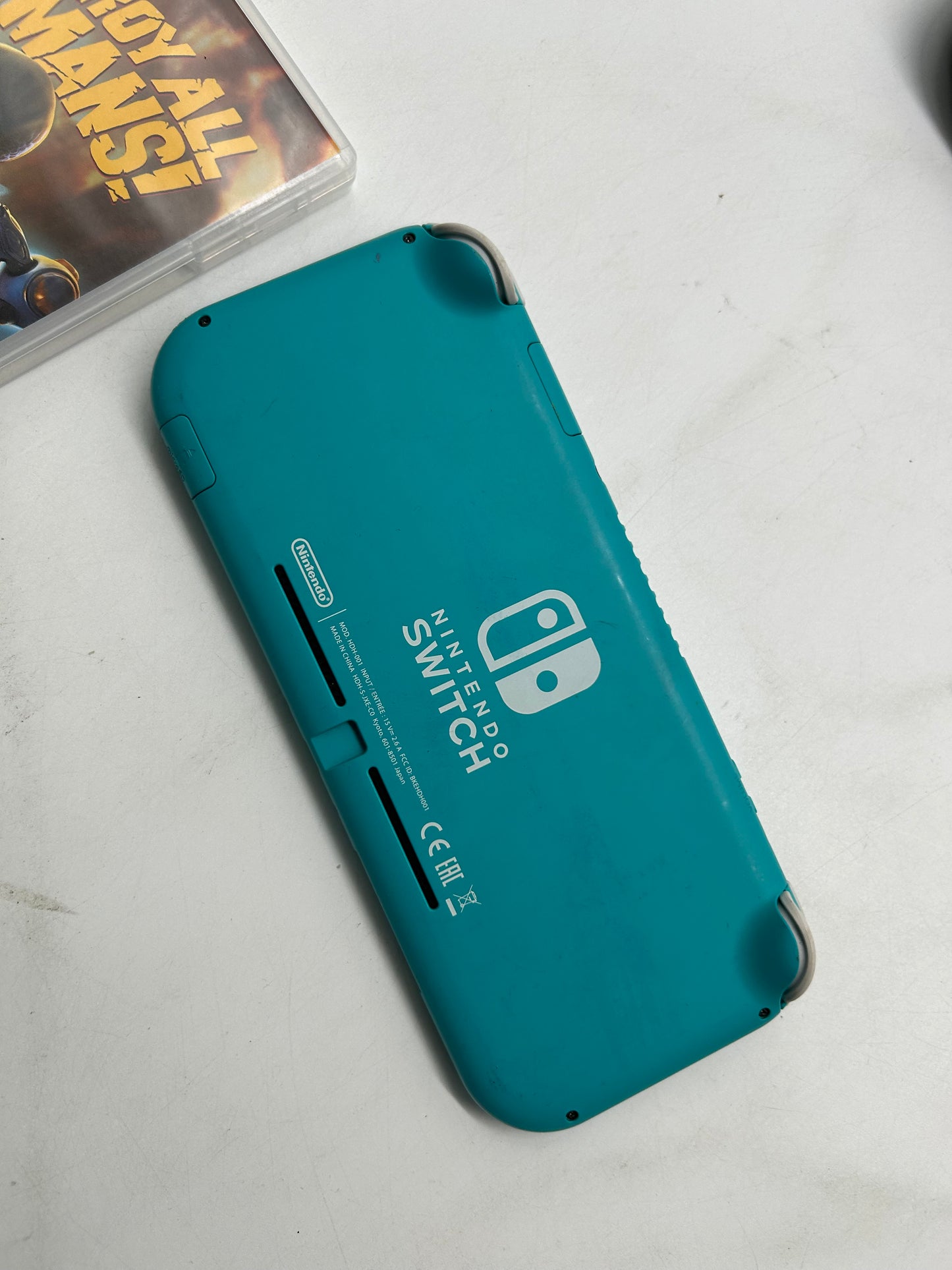 Nintendo Switch Lite Türkis mit Spiel und Tasche