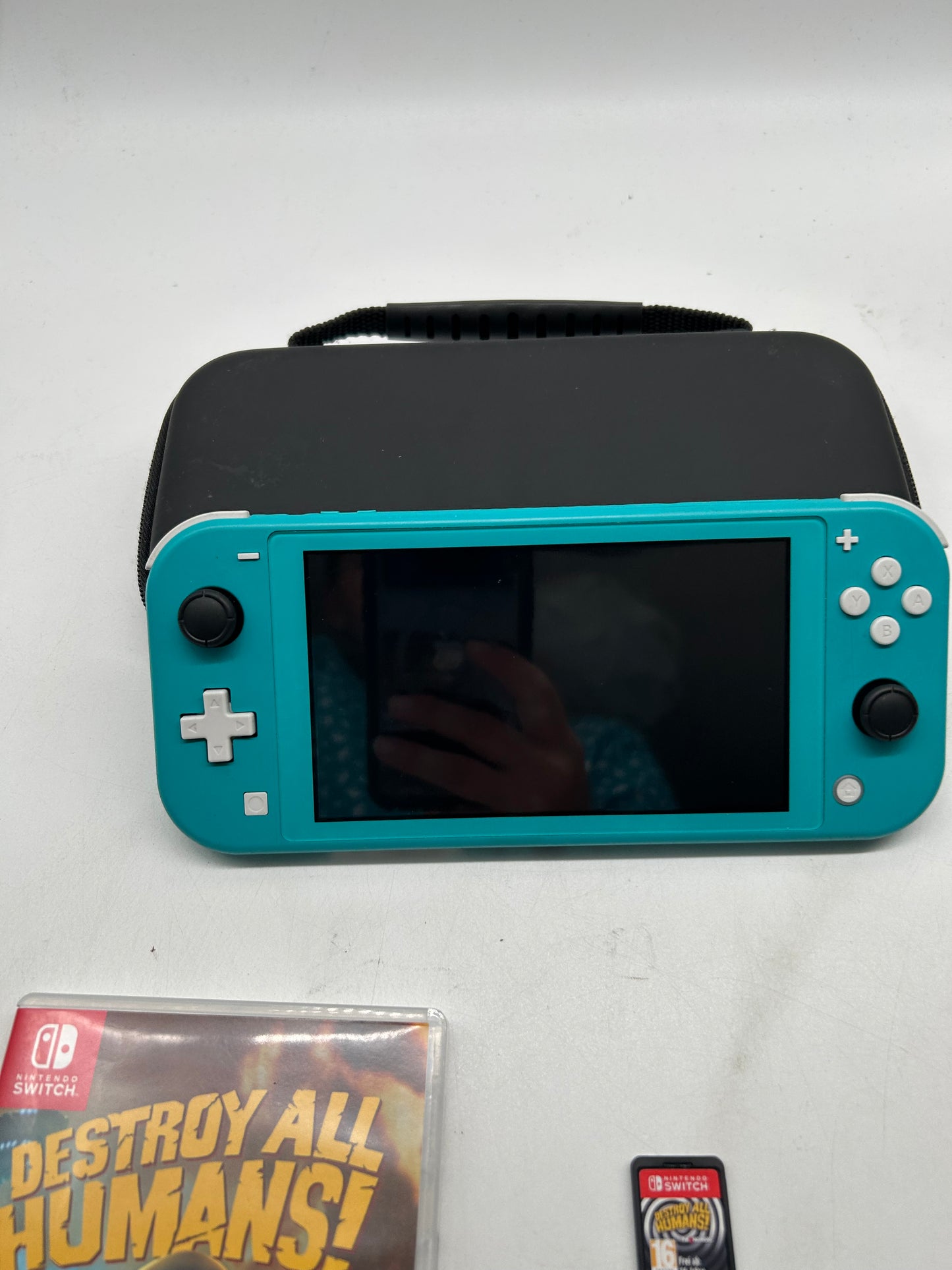 Nintendo Switch Lite Türkis mit Spiel und Tasche