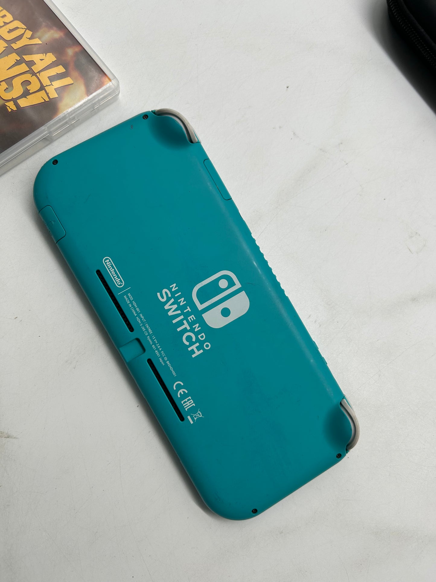 Nintendo Switch Lite Türkis mit Spiel und Tasche